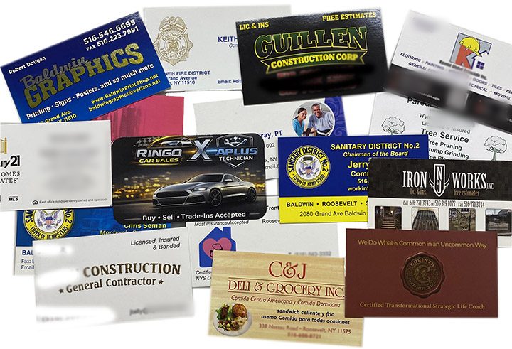 Business cards printed at Baldwin Graphics for local trades, restaurants and offices